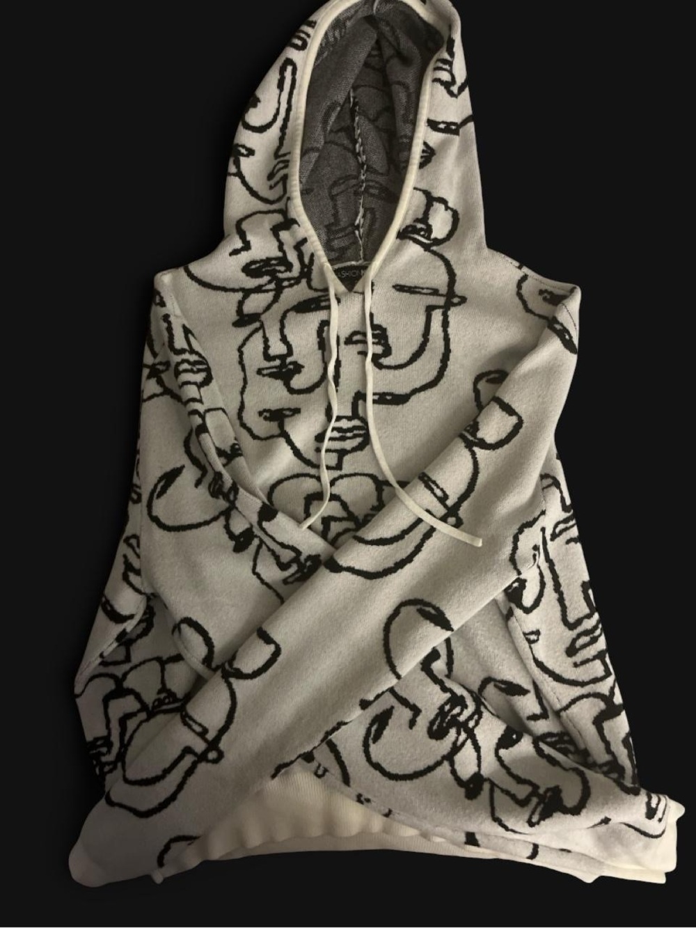 White 2 piece set with a black abstract face design